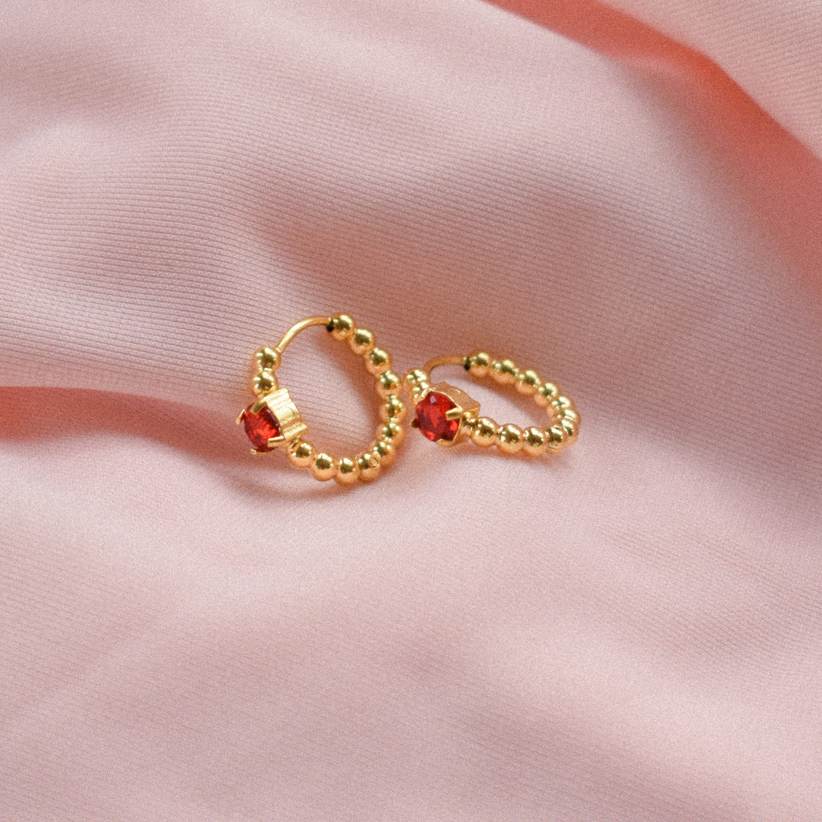 “Amara” Gold Huggie Earrings