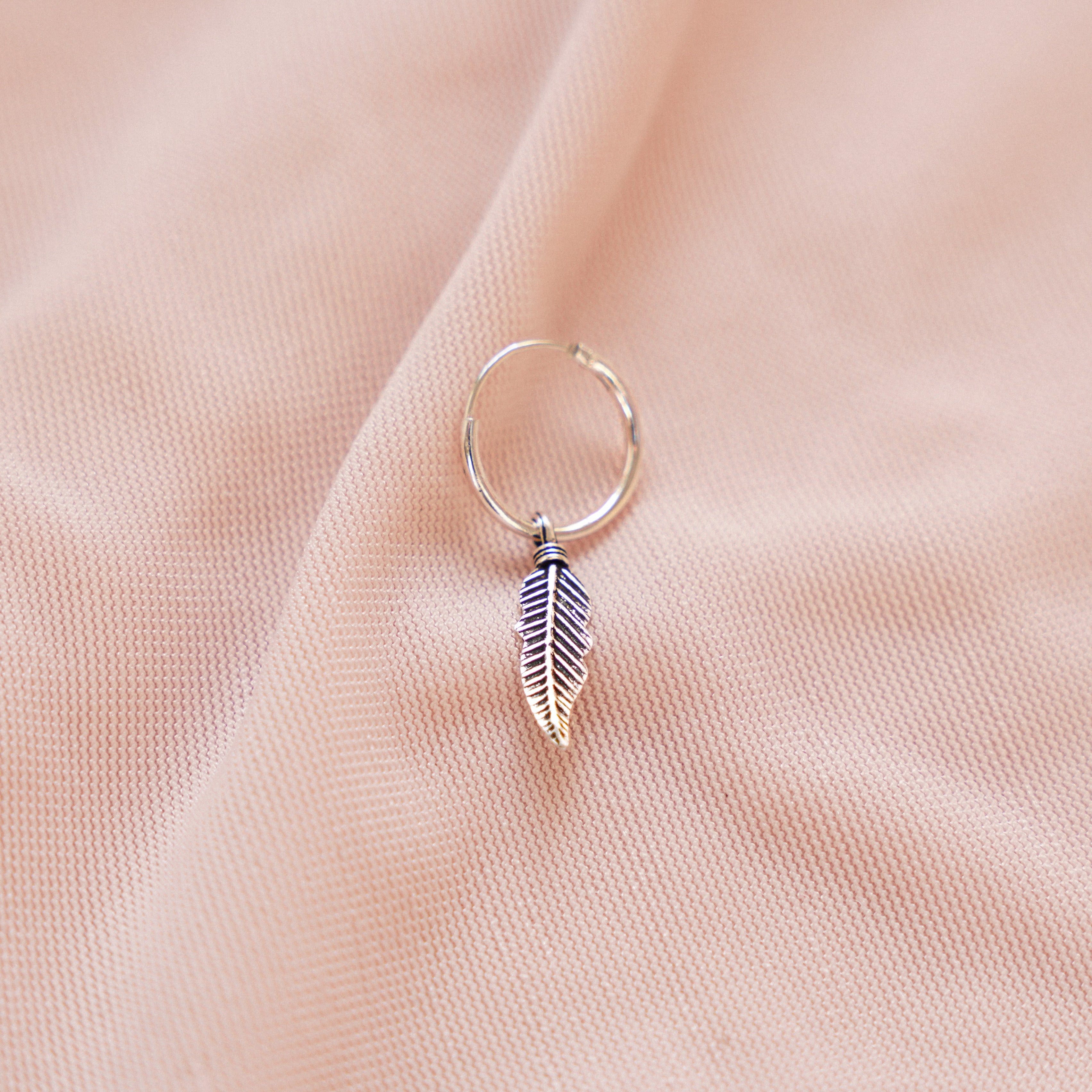 “Eliza" Sterling Silver Feather Huggies