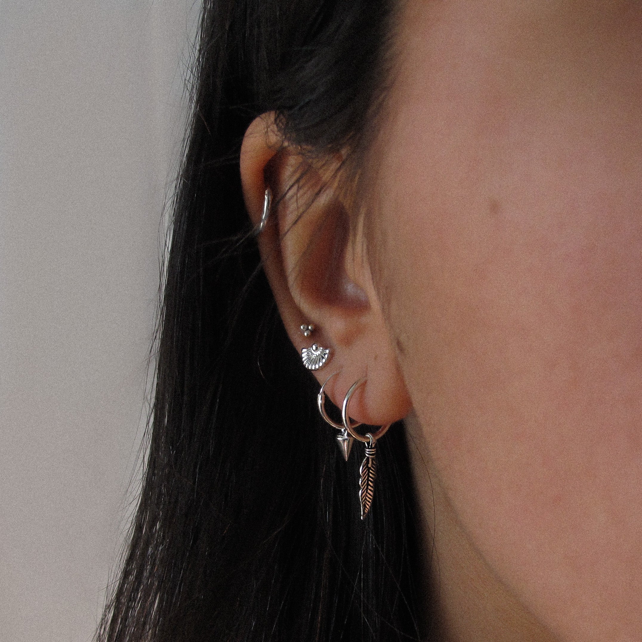 “Eliza" Sterling Silver Feather Huggies