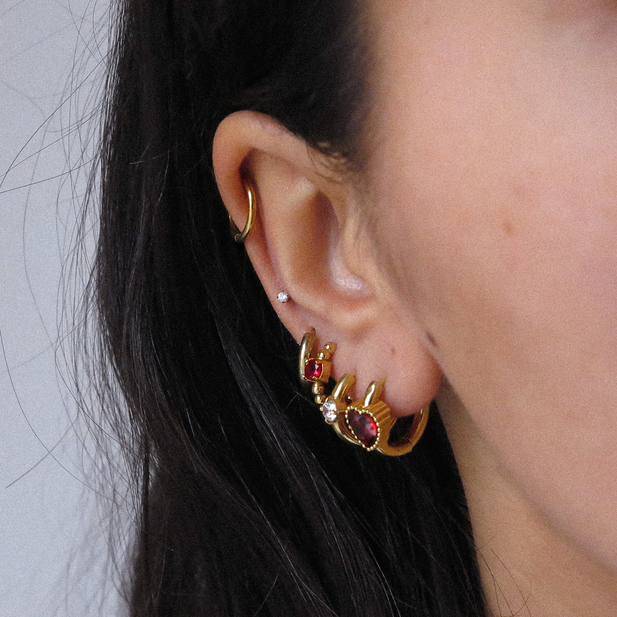 “Amara” Gold Huggie Earrings